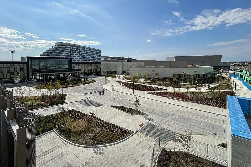 Great Canadian Casino Resort Toronto with its hotel tower, seen across the landscaped grounds